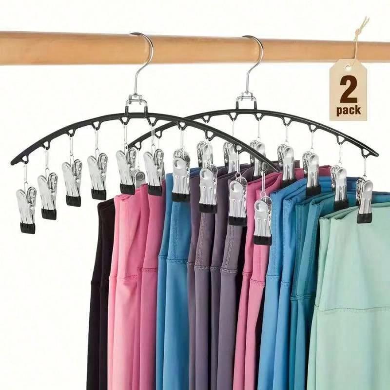 2 PACK OF: Space Saving Leggings Hangings Organizers.  2 Pack with 10 Clips Holds 20 Leggings. Perfect for maximizing closet space without folding or rolling, these organizers hang instantly wherever you need them and keep items securely in place without damage- SHIPS FREE!