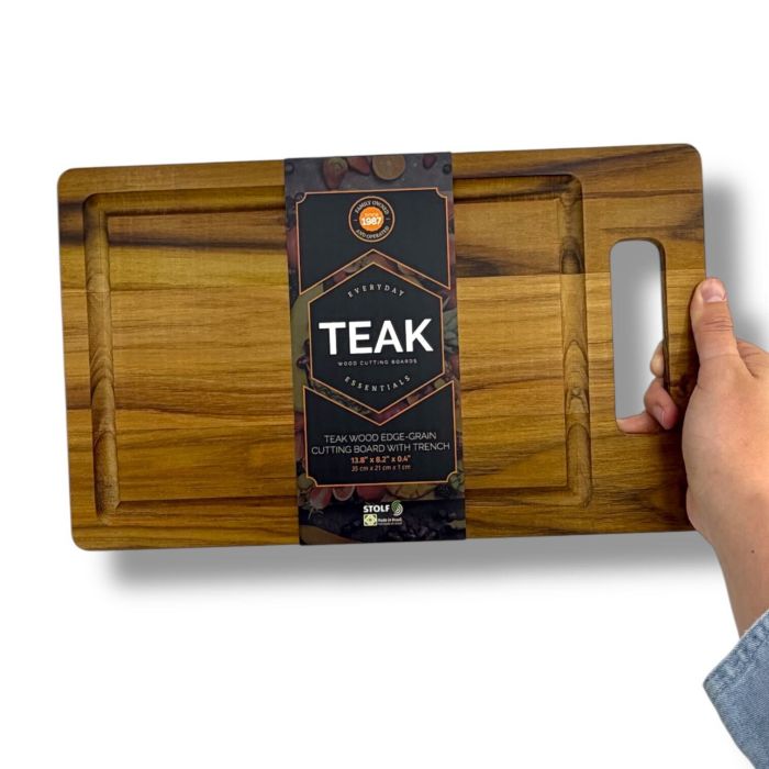 Set of TWO Teak Wood Cutting / Serving Boards With Handle - 13.8 x 8.2 x .5 in - 100 % natural teak wood - Teak is the king of cutting boards—tough, naturally water-resistant, and easy on your knives. And of course, they are absolutely beautiful! - Use as a cutting board of course, but also makes a stunning serving board - SHIPS FREE!