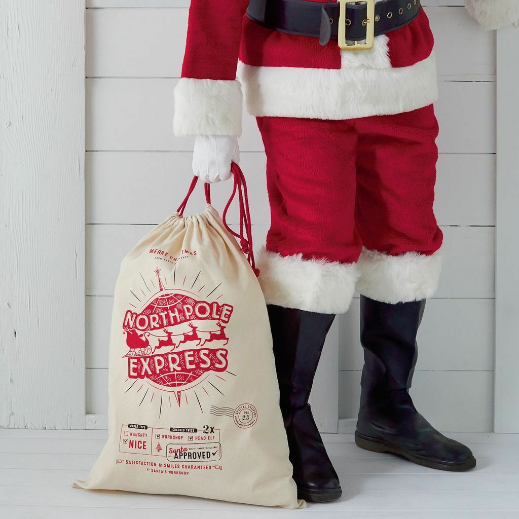 EARLY ACCESS PRE-ORDER - VERY early we know, we we won\'t be offering many of these this year - Will ship on or before November 10th - Mystery Santa\'s North Pole Express Delivery Canvas Gift Bag - Prefilled with mystery gifts! - This is an INCREDIBLY popular item every year and has become a tradition for a lot of families to open it together Christmas morning :) - Honestly, they\'re a giant pain in the butt for us to assemble, but knowing it makes y\'all smile makes it worth every second! - - LIMIT 3 PER CUSTOMER AND PLEASE NOTE ITEMS MAY REPEAT IN THE BAGS!